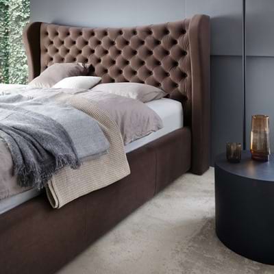Barna kárpitozott ágyak: az elegancia és kényelem mesterfokon